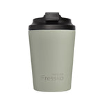Green tumbler with black lid on a white background, branded 'made by Fressko'.
