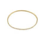 Gold bracelet on a white background