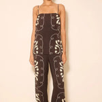 Woman wears a black and white print matching set