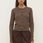 Woman wearing a brown wool cardigan