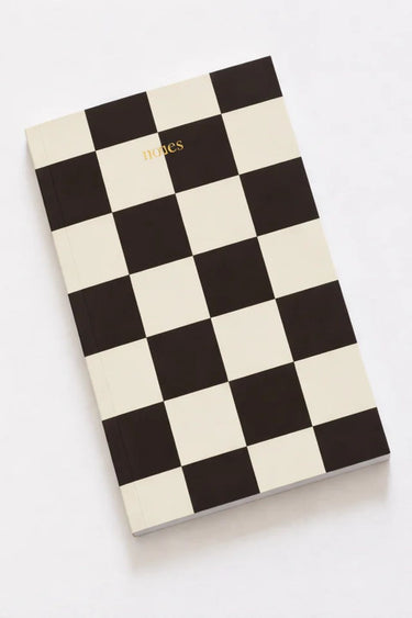 Checkered notebook with 'Diaries' text on a white background