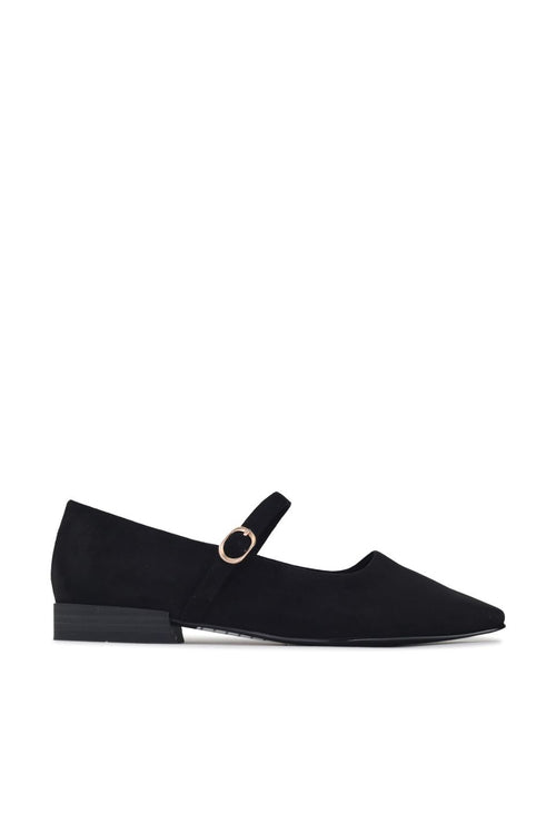 Black velvet loafers on a light gray background