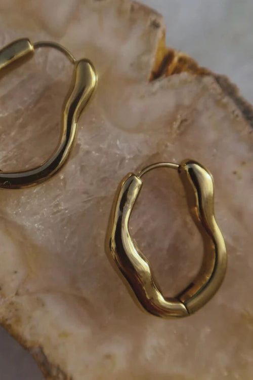 organic wavy gold earring