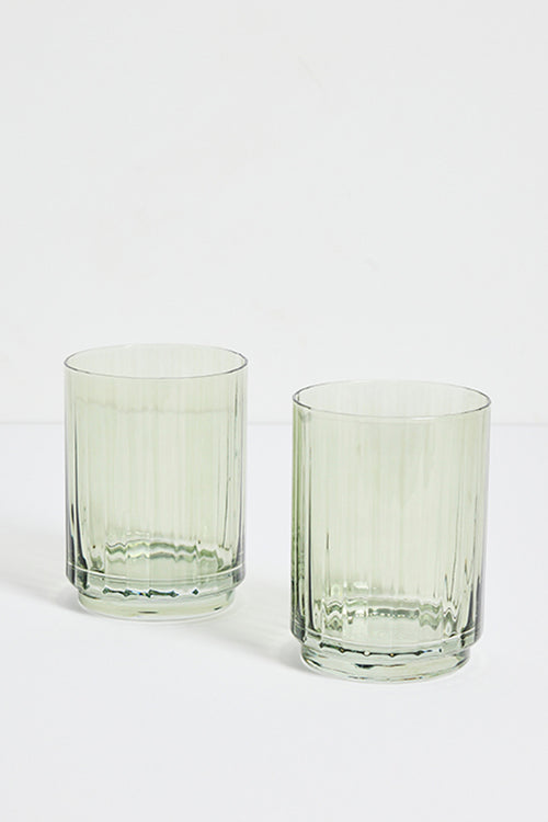two green ribbed tumblers