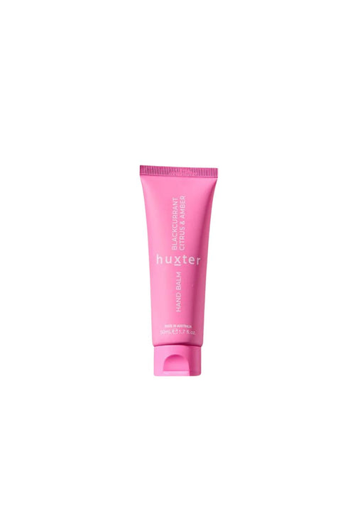 Pink tube of huxter product on a white background