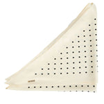 An off-white pocket square with a black polka dot pattern, folded into a triangle shape on a solid white background.