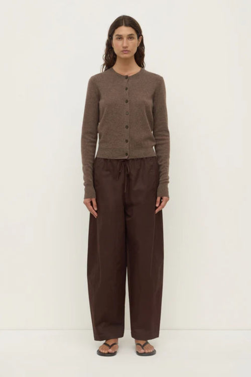 Woman wearing a brown wool cardigan