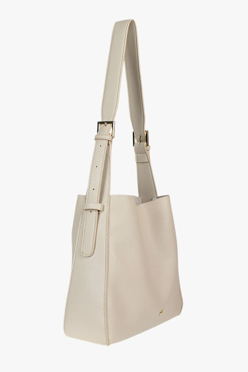 cream handbag