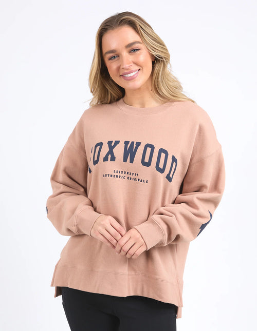 Model wears tan foxwood crewneck jumper