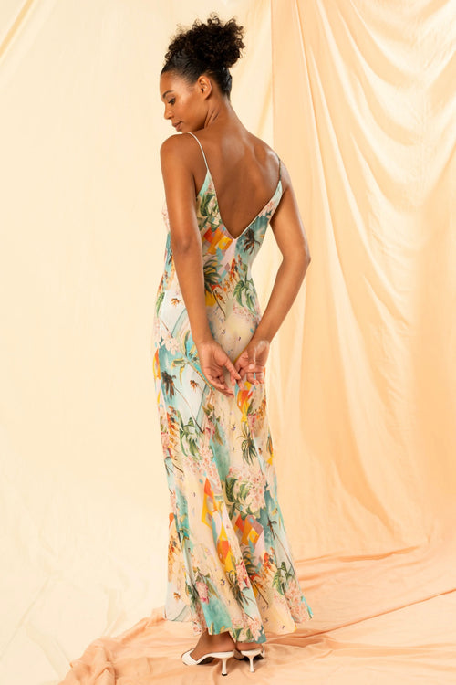 model wears a blue printed maxi dress