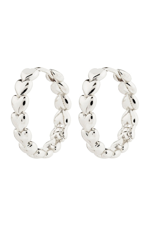 Pair of silver hoop earrings on a white background
