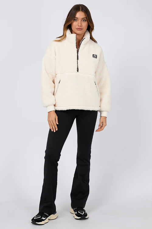 model wears a white teddy sweatshirt