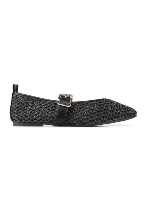 A pair of black pointed-toe flats with a textured, openwork mesh-like upper and a thin strap across the instep with a small gold-tone buckle, shown on a plain white background.