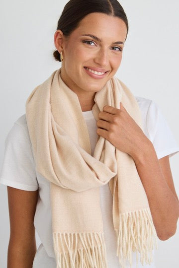 model wears Cream Scarf