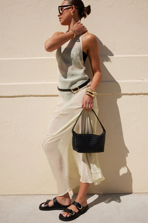 black sandal with gold detailing