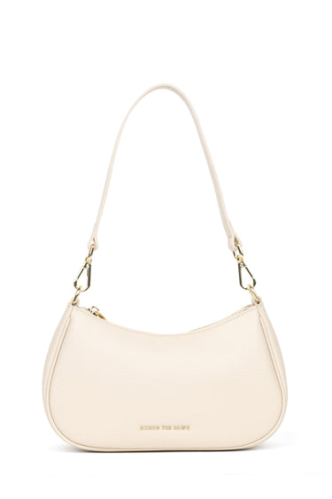 A cream-colored faux leather crescent-shaped shoulder bag with gold hardware and a small gold logo on the front, displayed on a clean white background.
