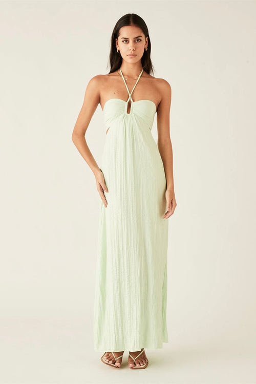 model wears a mint maxi dress