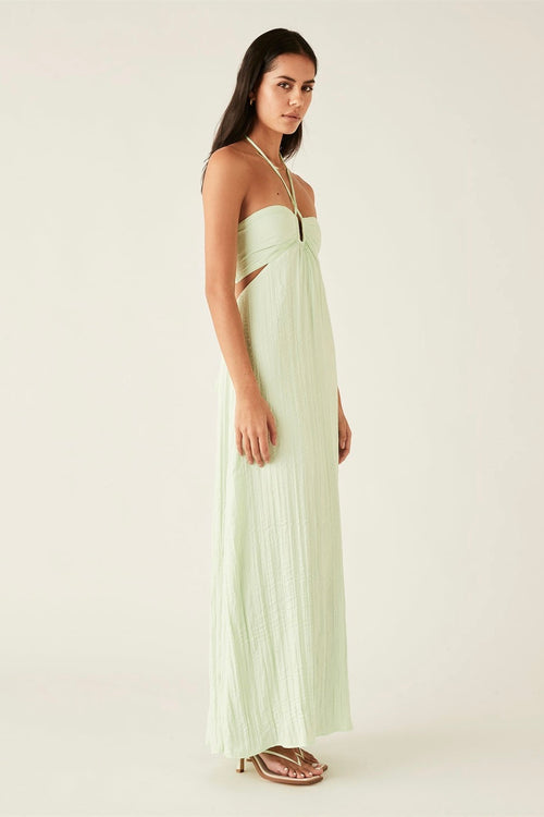 model wears a mint maxi dress