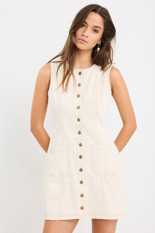 light denim mini dress with button front on model