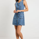 Model wears a denim mini blue dress 