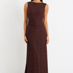 Woman wearing a brown lace maxi dress