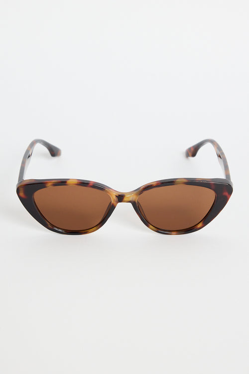A pair of brown tortoiseshell cat-eye sunglasses with slim arms, photographed on a white background.