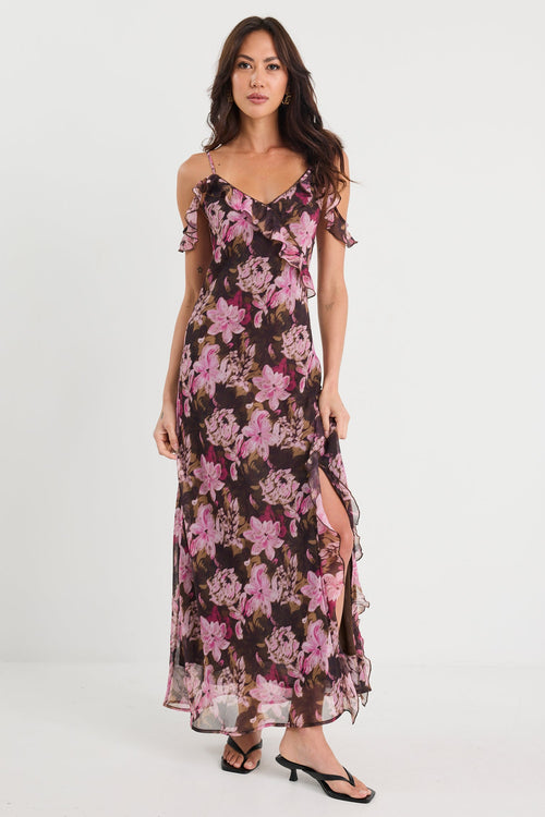 Woman wearing a floral dress on a white background