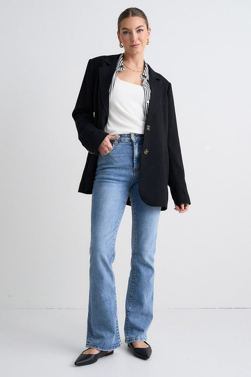 model wears a Black Oversized Blazer