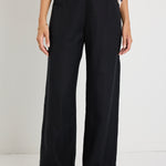 model wears a black linen pants