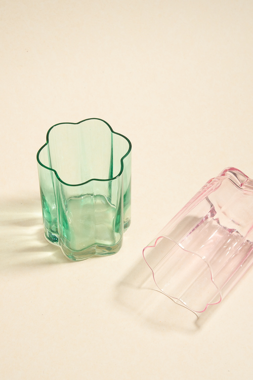 green flower shaped glass and pink flower shaped glass