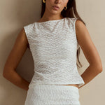 white lace top and skirt