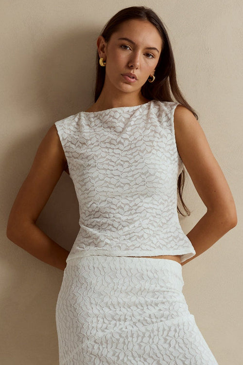 white lace top and skirt