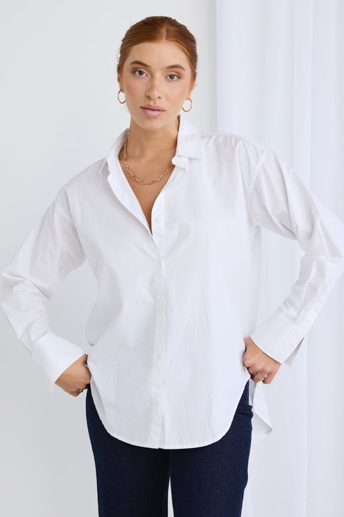 Model wears a white shirt