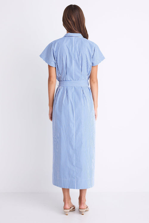 Woman wearing a bright blue striped midi shirt dress with short sleeves, button front, waist tie, and pleated skirt.