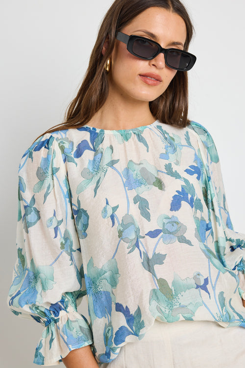 Candid Blue Cream Floral Frill Sleeve Crew Neck SS Top
