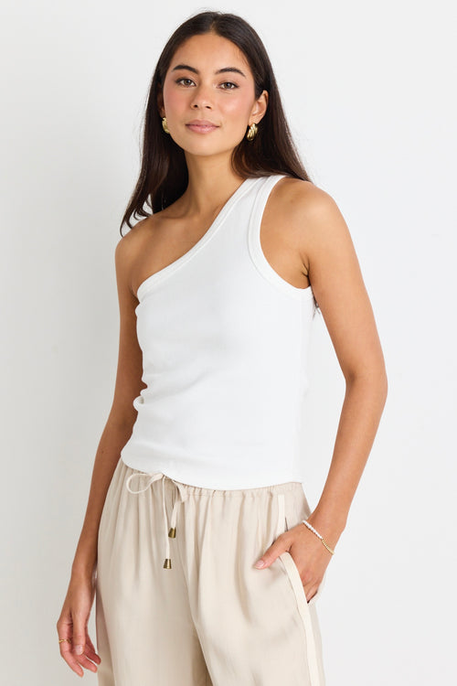 model wears a white one shoulder tank