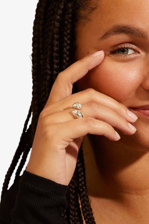 model wearing silver adjustable ring