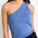 model wears a blue one shoulder top