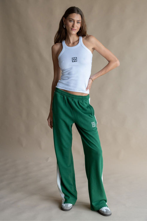 model wears a Green Track Pant