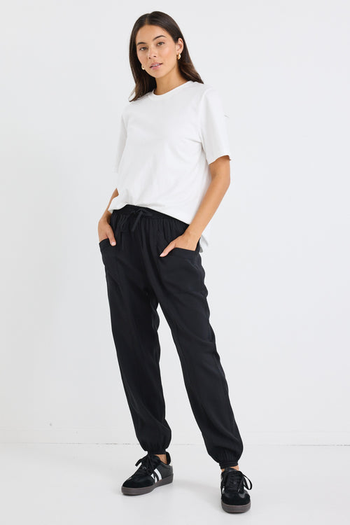 model wears a black drawstring jogger