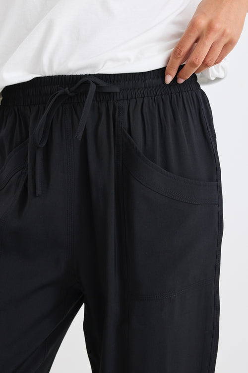 model wears a black drawstring jogger