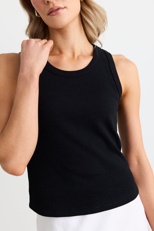 model wears a black tank top