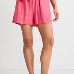 model wears a pink linen short