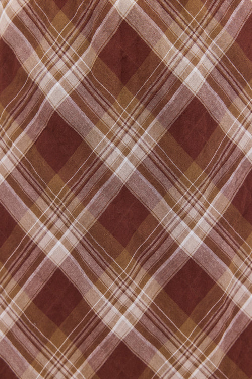 Plaid fabric pattern with brown and beige colors