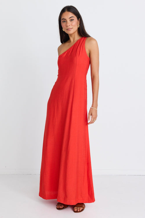 model wears a one shoulder red maxi dress