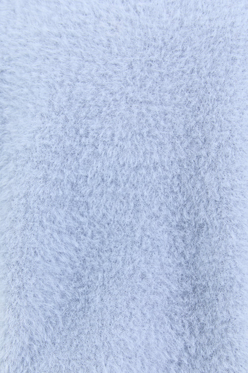 Close-up of textured light blue fabric