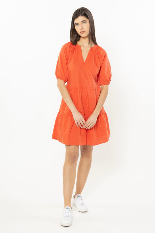 model wears orange Linen Mini Dress
