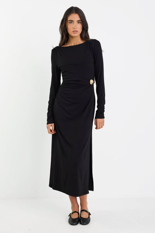 Woman wearing a black dress on a white background