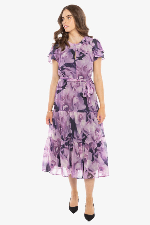 model in purple floral maxi dress