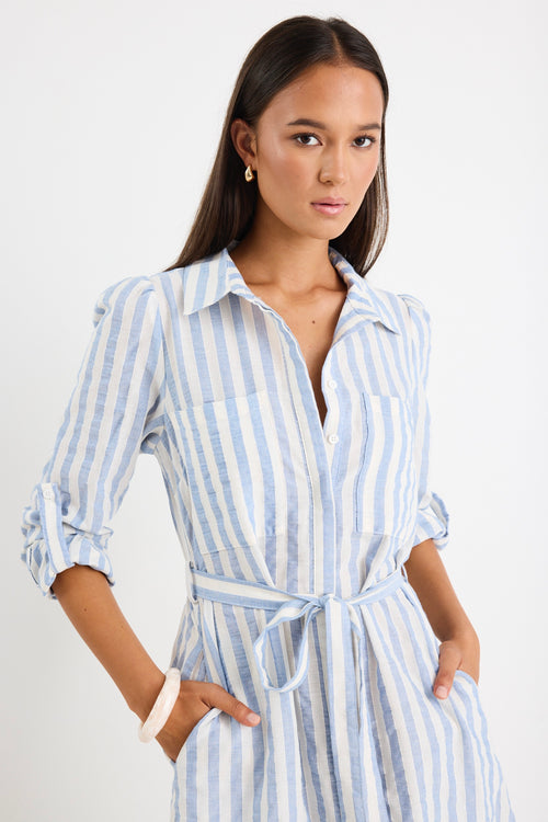 model wears a blue and white stripe shirt midi dress